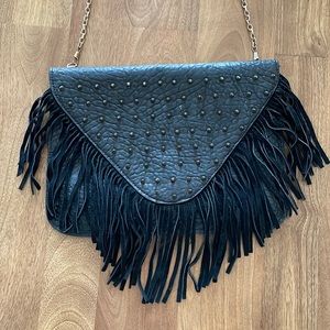 Black studded clutch